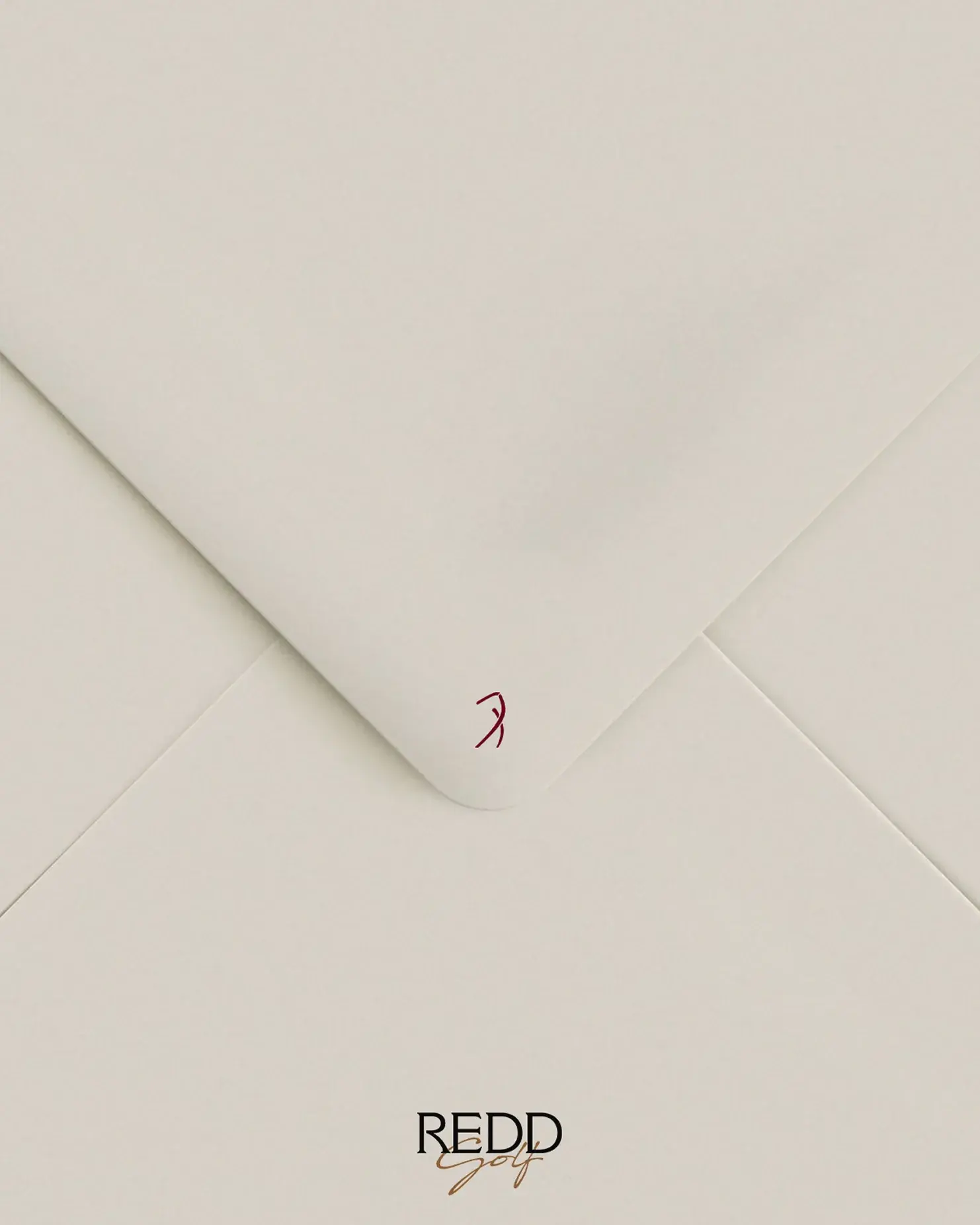 White envelope with the Redd Golf wordmark