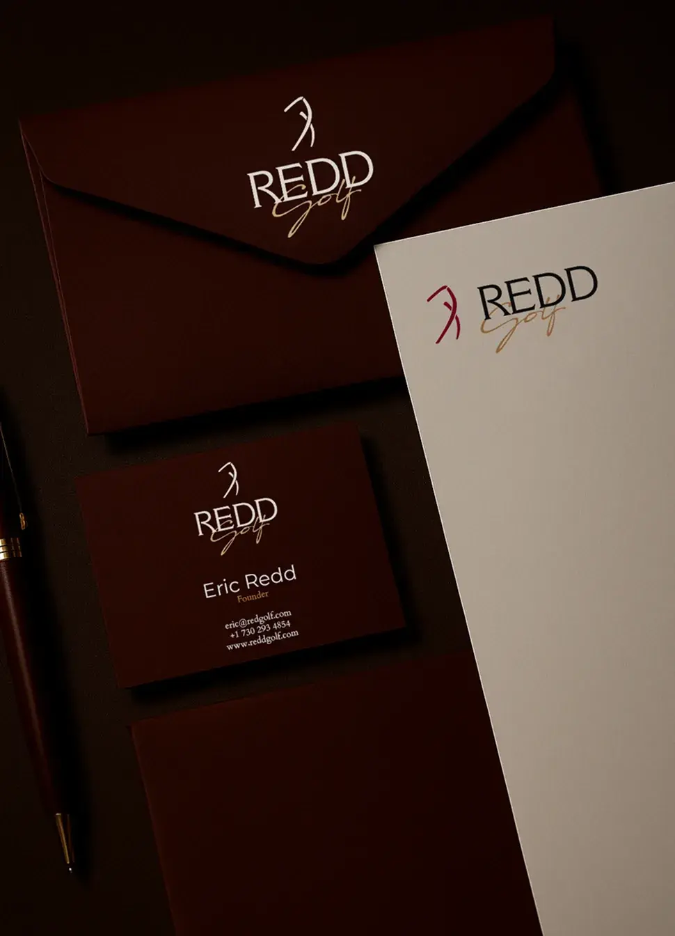 Redd Golf envelopes, letterhead, and Eric Redd business card in maroon and cream
