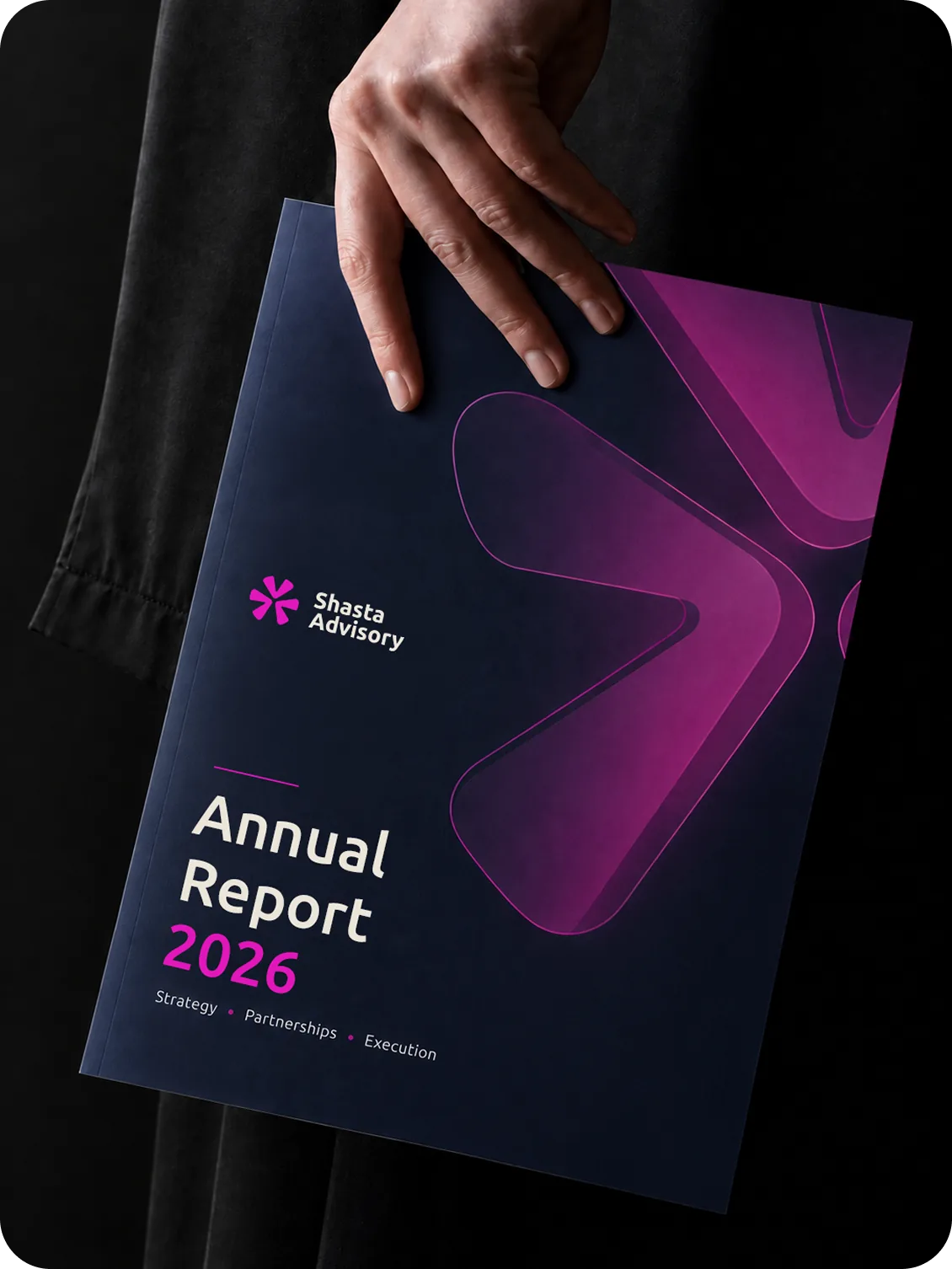 Hand holding the Shasta Advisory 2026 annual report cover
