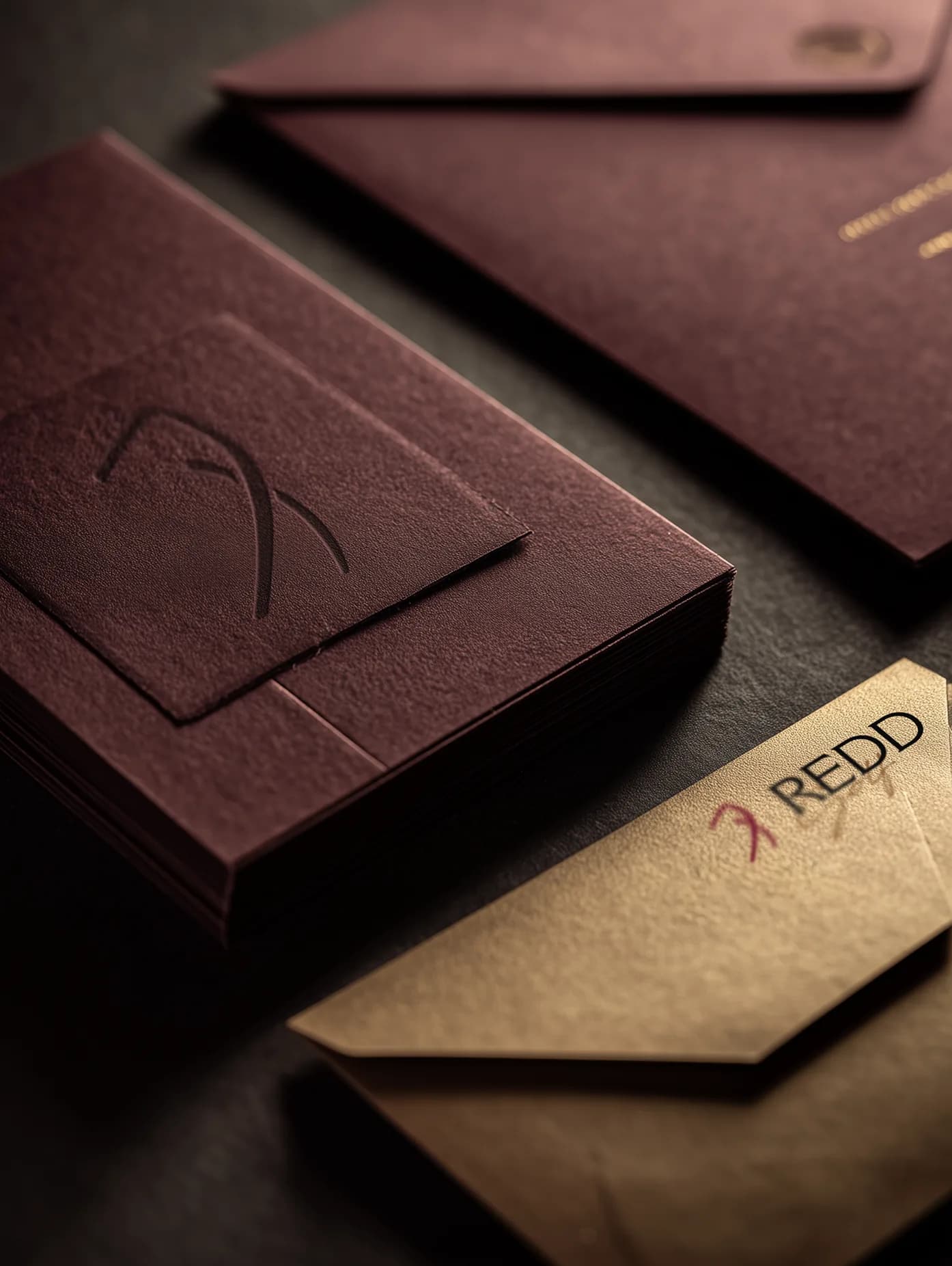 Redd Golf luxury stationery in dark maroon